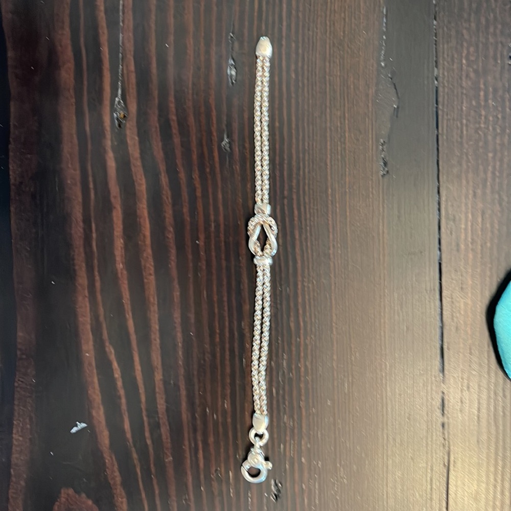 Tiffany double knot sterling silver bracelet. Excellent used condition.